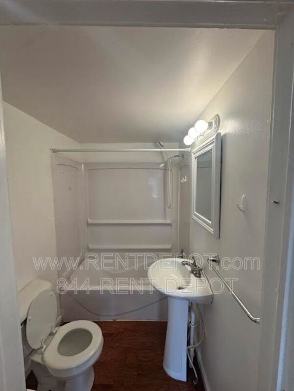 Spacious 1BR Home with Fenced Yard, Garage & Bonus Sunroom – Pet Friendly! property image